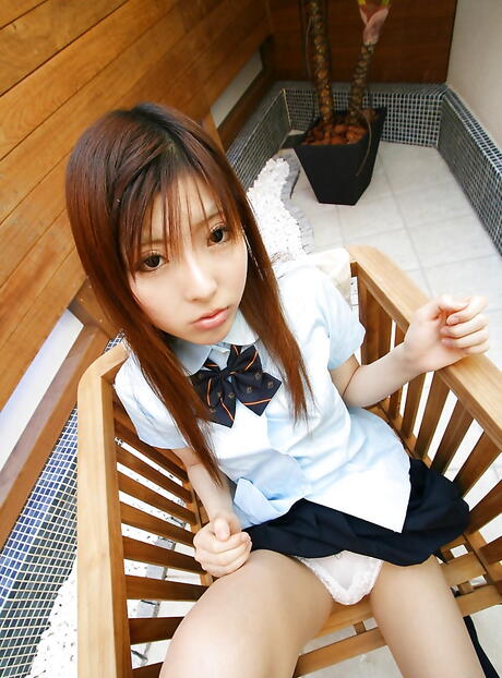 Rangy japanese teen Miyo in skirt exposing small tits and playing with toy 